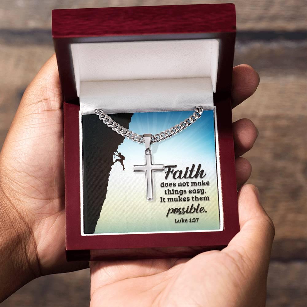 Necklace with cross pendant and inspirational card held in a hand