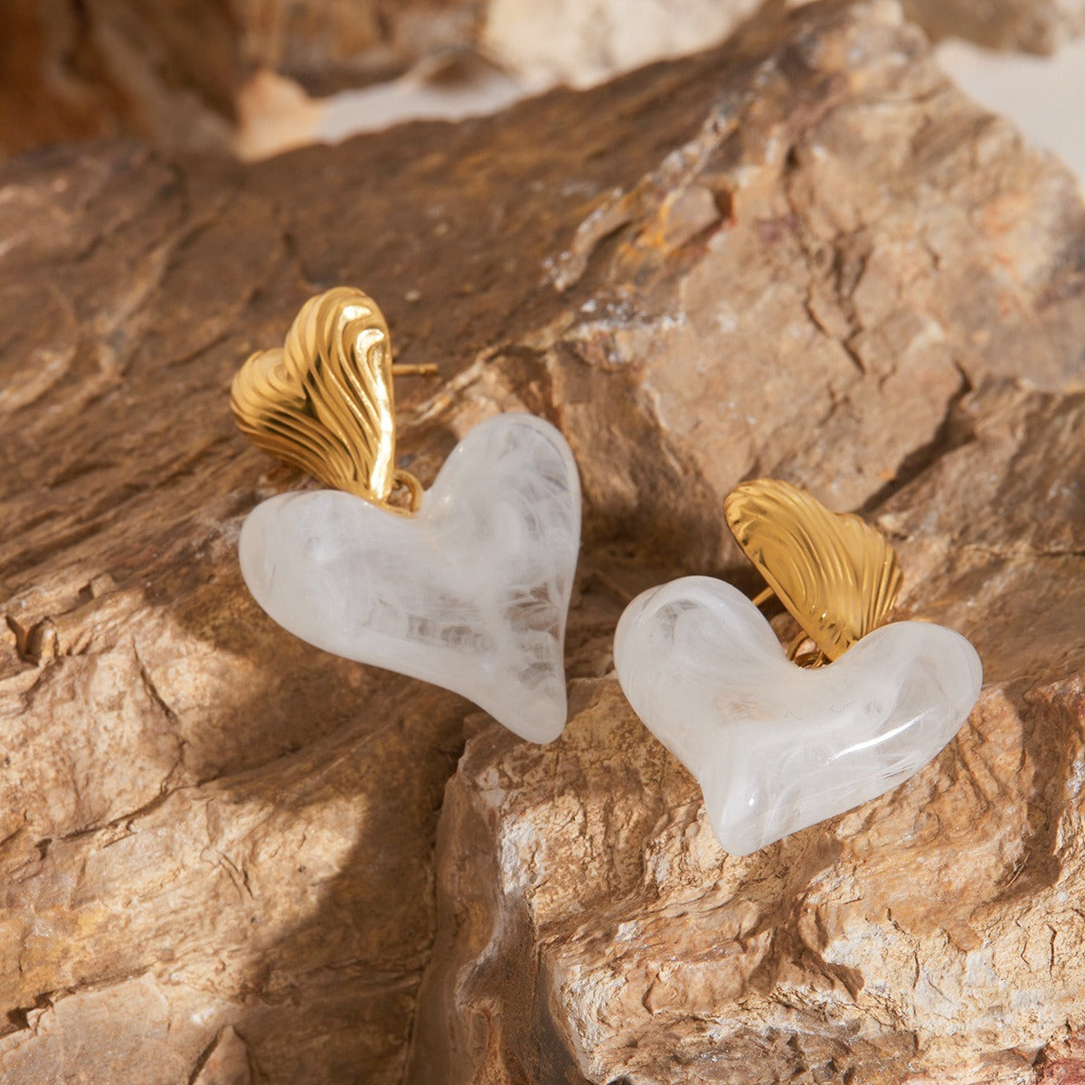 18K gold heart earrings side view - delicate stud design
