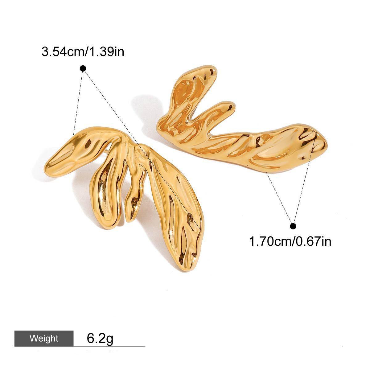 18K gold wing earring detail showing modern geometric design
