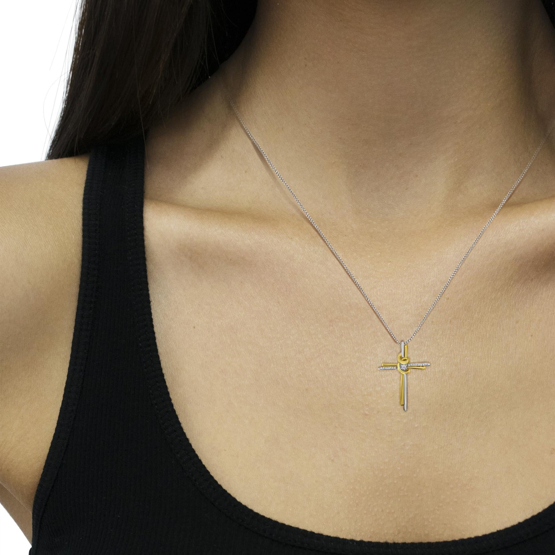 10K gold diamond cross necklace by Camili'Bel worn on model, featuring two-tone gold and genuine diamonds. Elegant fine Christian jewelry for women.