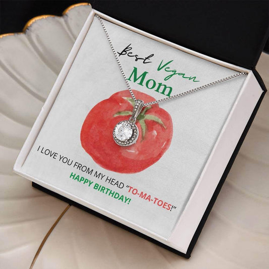 Dazzling Eternal Hope necklace in 14K white gold finish, presented in a gift box with a tomato pun card for a vegan mom's birthday.