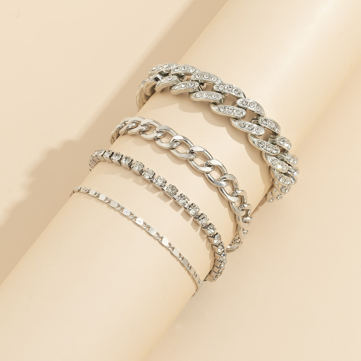 Close-up of Cuban link bracelet with diamond-studded accents - iced out style
