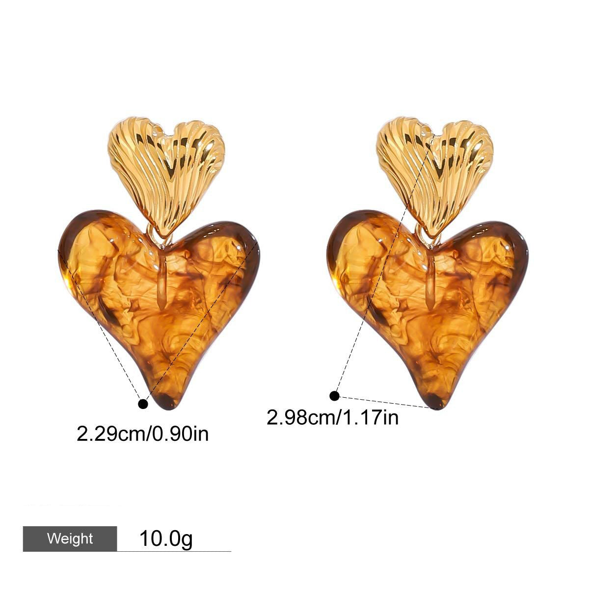 18K gold heart earring detail showing premium quality finish